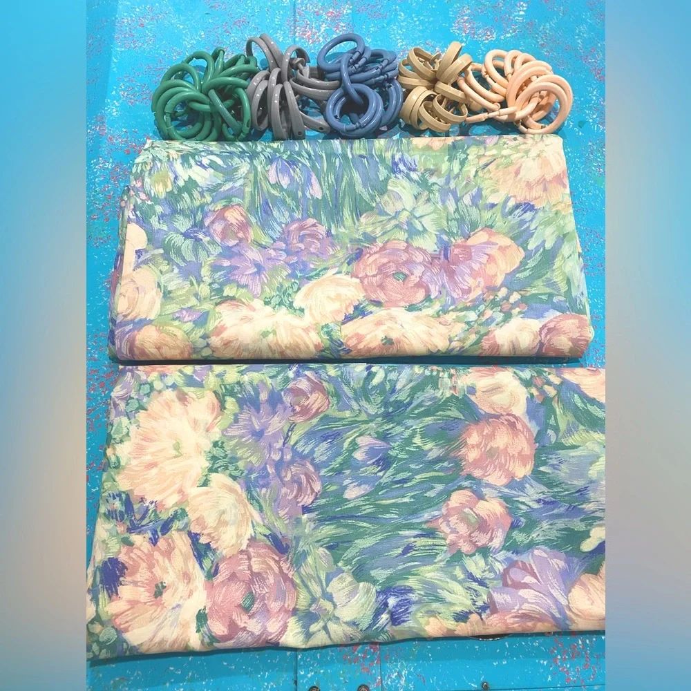 2 Floral Patterned Shower Curtains plus 5 sets of shower curtain hooks
